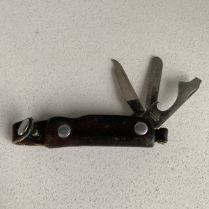 Bassett USA Keychain Multitool With Bottle Opener, Nail File, Leather Cover